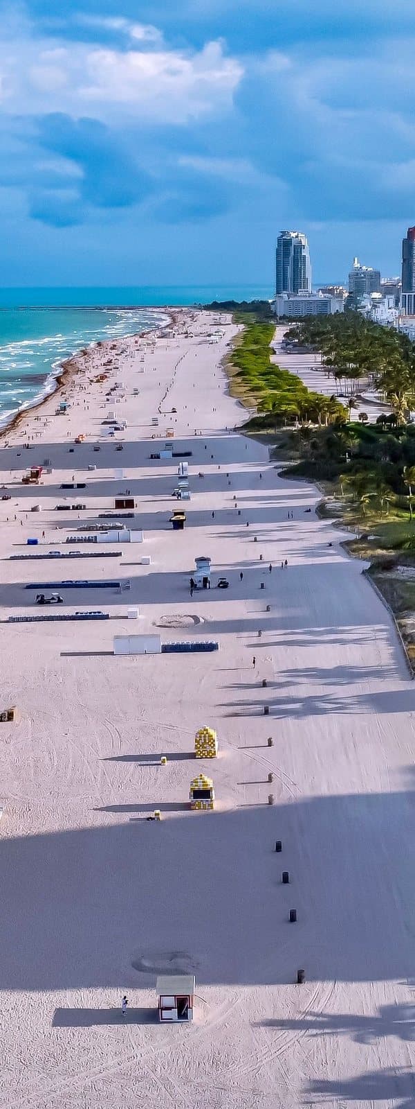 The beach and boardwalk running north along Miami Beach