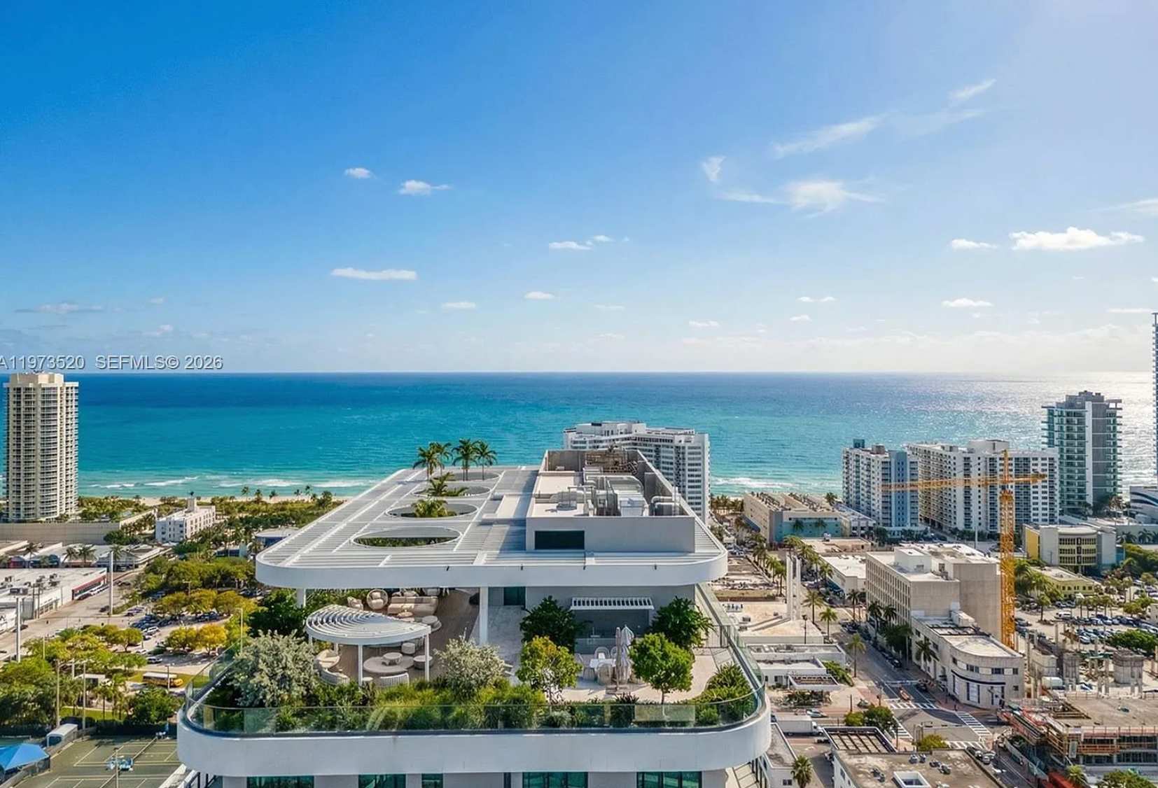Panoramic high-rise views where the city meets the sea.