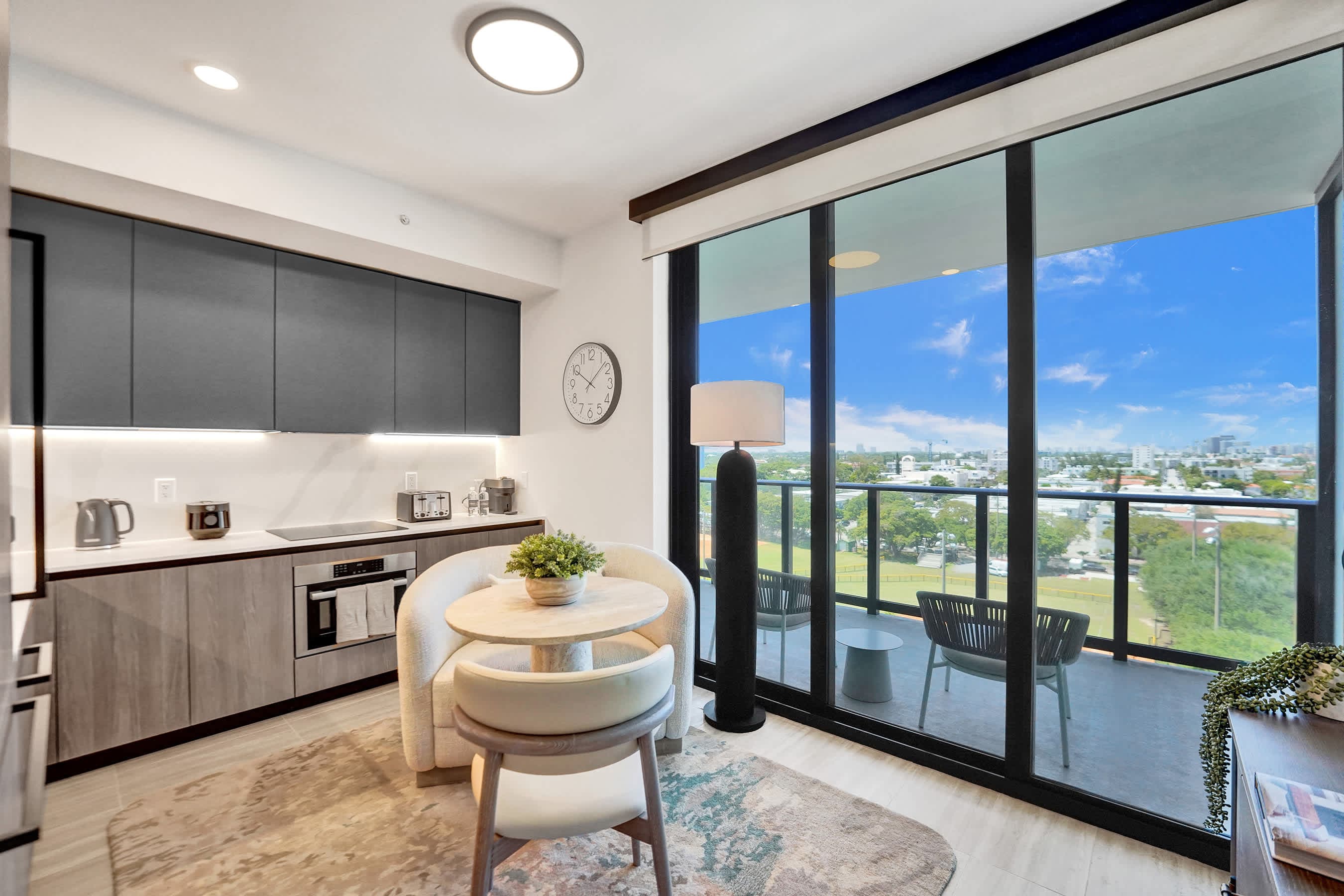 Bright dining space with stunning floor-to-ceiling views.