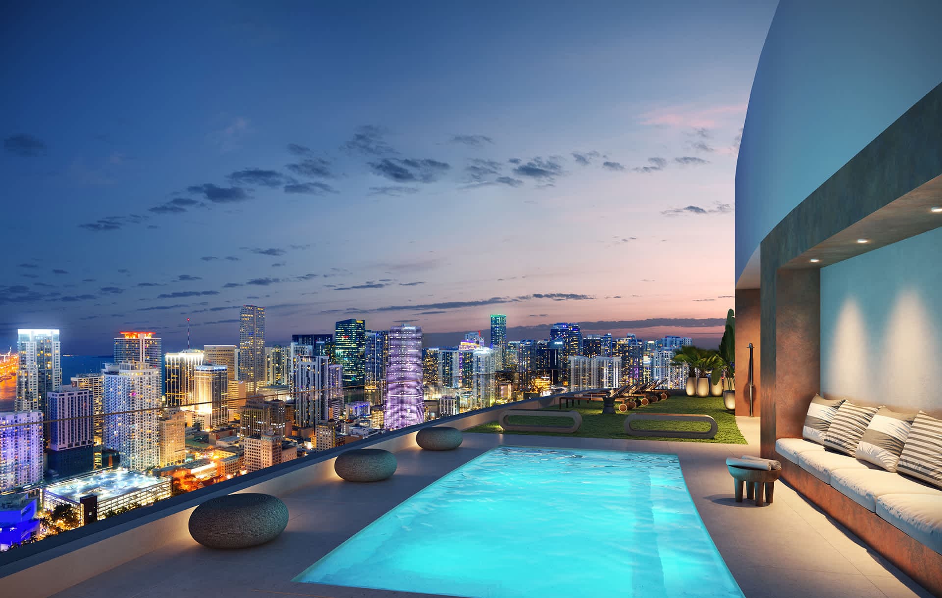 The rooftop infinity pool at sunset at District 225, Downtown Miami